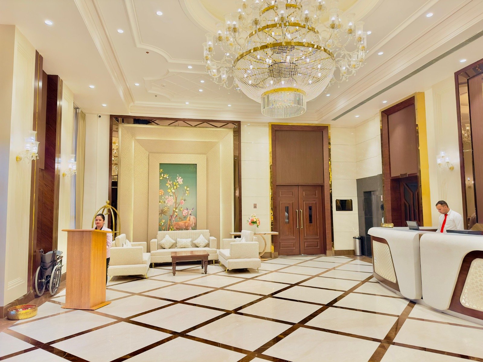 Elegant hotel lounge with warm lighting and plants